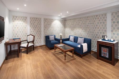 Imagen de la habitación del Hotel MJ Sarovar Portico Haridwar. Foto 13