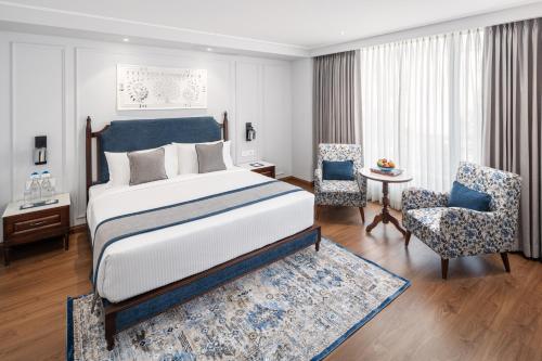 Imagen de la habitación del Hotel MJ Sarovar Portico Haridwar. Foto 15