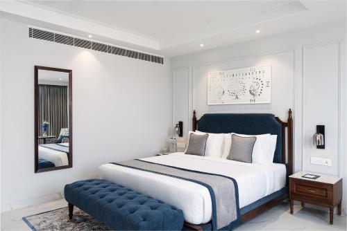 Imagen de la habitación del Hotel MJ Sarovar Portico Haridwar. Foto 18