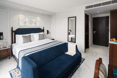 Imagen de la habitación del Hotel MJ Sarovar Portico Haridwar. Foto 20