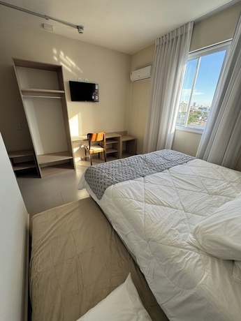 Imagen de la habitación del Hotel MLG HOTEL. Foto 11
