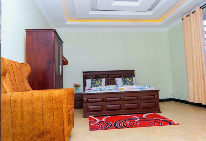 Imagen de la habitación del Hotel MLIMWA HILL PALACE. Foto 15