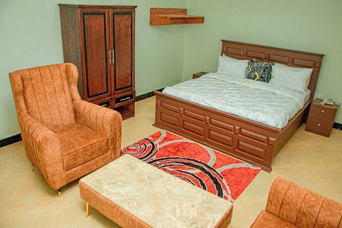 Imagen de la habitación del Hotel MLIMWA HILL PALACE. Foto 16