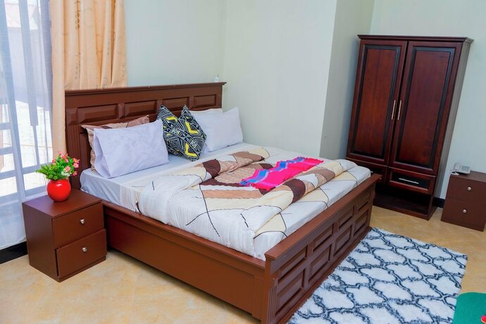 Imagen de la habitación del Hotel MLIMWA HILL PALACE. Foto 17