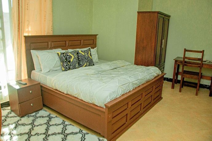 Imagen de la habitación del Hotel MLIMWA HILL PALACE. Foto 18