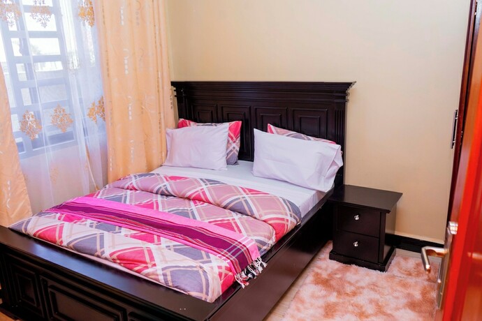 Imagen de la habitación del Hotel MLIMWA HILL PALACE. Foto 19