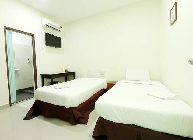 Imagen de la habitación del Hotel MN Ferringhi Inn. Foto 7