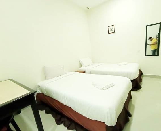 Imagen de la habitación del Hotel MN Ferringhi Inn. Foto 9