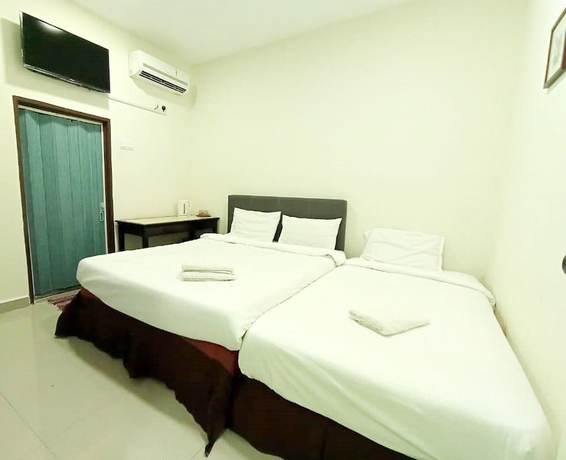 Imagen de la habitación del Hotel MN Ferringhi Inn. Foto 13