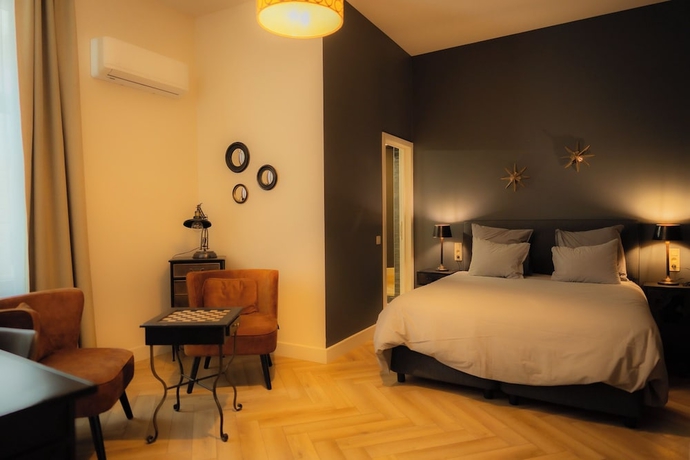 Imagen de la habitación del Hotel MONS GRAND PLACE. Foto 3