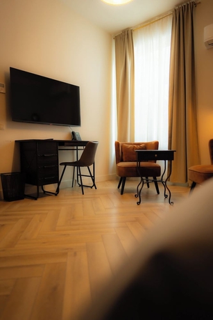 Imagen de la habitación del Hotel MONS GRAND PLACE. Foto 4