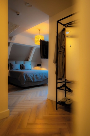 Imagen de la habitación del Hotel MONS GRAND PLACE. Foto 8