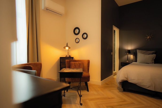 Imagen de la habitación del Hotel MONS GRAND PLACE. Foto 15