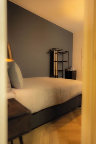 Imagen de la habitación del Hotel MONS GRAND PLACE. Foto 16