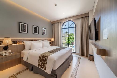 Imagen de la habitación del Hotel MONTANA @OCEANSIDE MANDALIKA. Foto 15