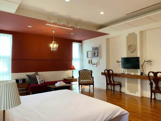 Imagen de la habitación del Hotel MOO TIME INN. Foto 5