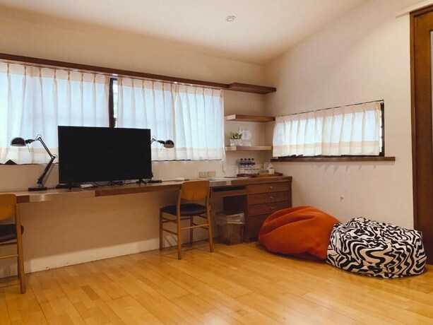 Imagen de la habitación del Hotel MOO TIME INN. Foto 7