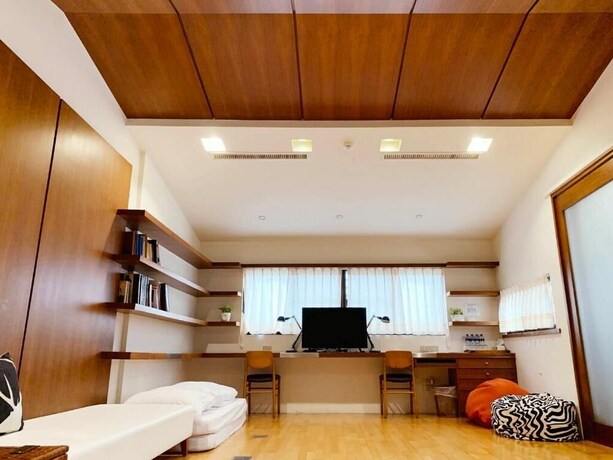 Imagen de la habitación del Hotel MOO TIME INN. Foto 8
