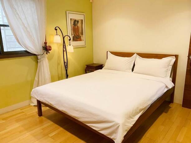 Imagen de la habitación del Hotel MOO TIME INN. Foto 11