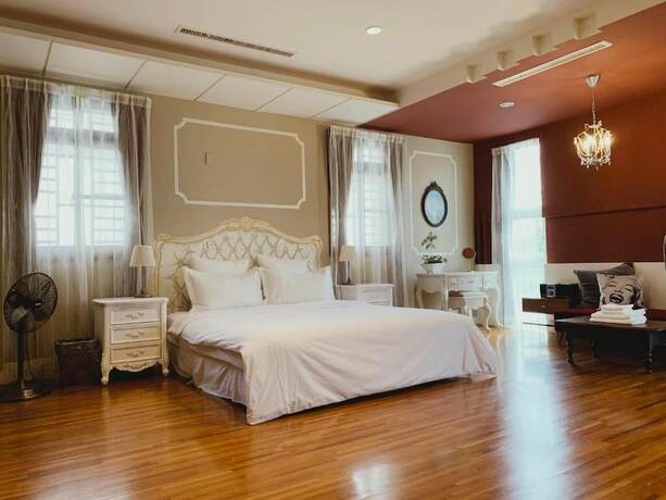 Imagen de la habitación del Hotel MOO TIME INN. Foto 12