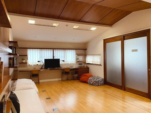 Imagen de la habitación del Hotel MOO TIME INN. Foto 15