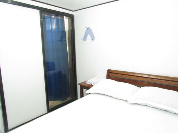 Imagen de la habitación del Hotel MOPE Beach Resort. Foto 12