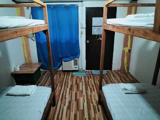 Imagen de la habitación del Hotel MOPE Beach Resort. Foto 15