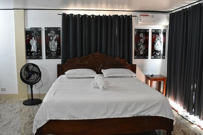 Imagen de la habitación del Hotel MOPE Beach Resort. Foto 16