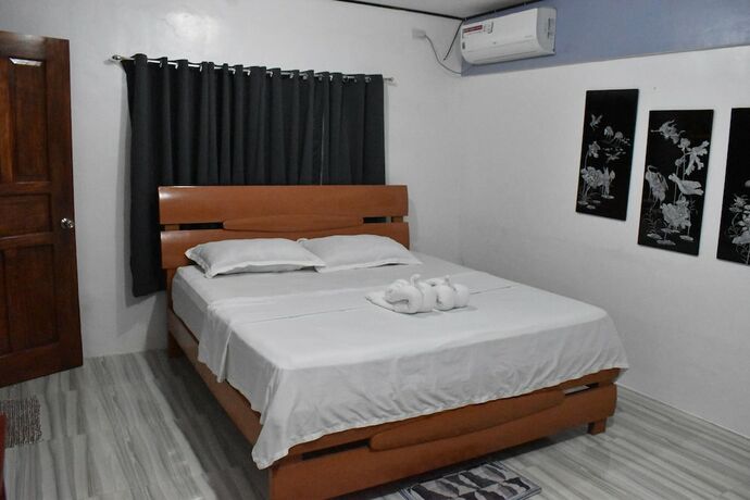 Imagen de la habitación del Hotel MOPE Beach Resort. Foto 18