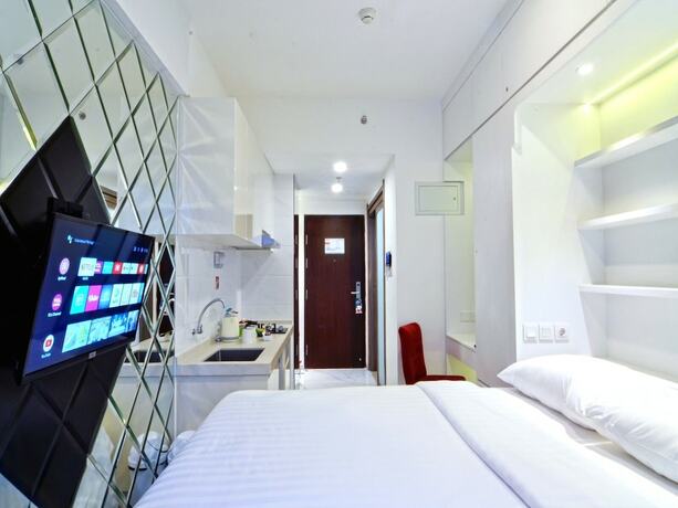 Imagen de la habitación del Hotel MORITZ INN BSD. Foto 12