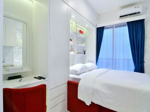 Imagen de la habitación del Hotel MORITZ INN BSD. Foto 13