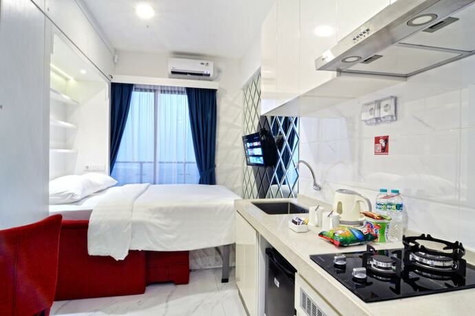 Imagen de la habitación del Hotel MORITZ INN BSD. Foto 14