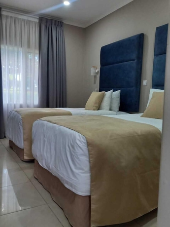 Imagen de la habitación del Hotel MUKUBA HOTEL. Foto 5