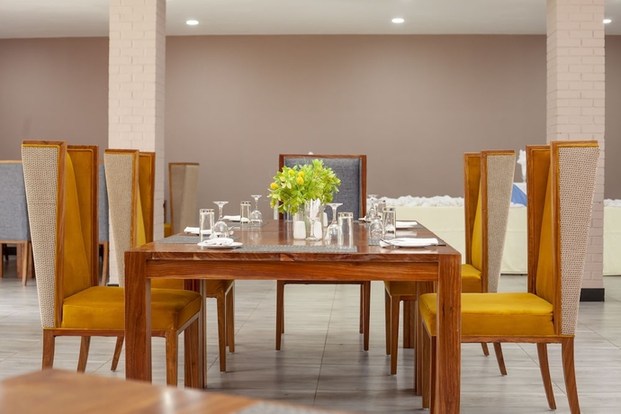 Imagen del bar/restaurante del Hotel MUKUBA HOTEL. Foto 4