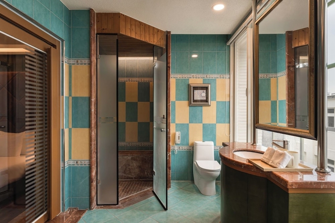 Imagen de la habitación del Hotel MUMU JIAO-XI. Foto 10