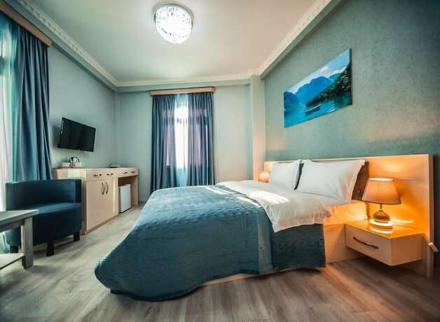 Imagen de la habitación del Hotel MUSMORE Boutique. Foto 16