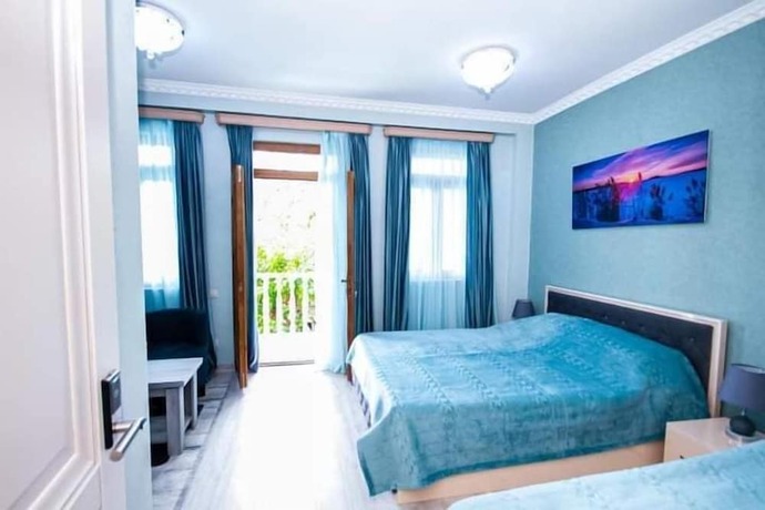Imagen de la habitación del Hotel MUSMORE Boutique. Foto 17