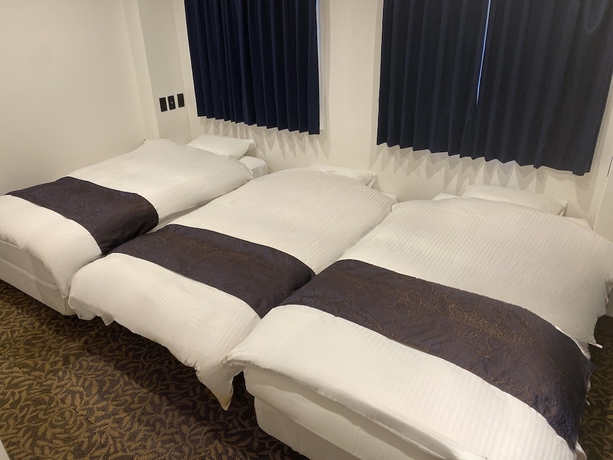 Imagen de la habitación del Hotel MUST WIN HOTEL. Foto 6