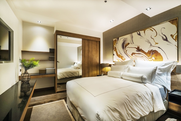 Imagen de la habitación del Hotel MUU Bangkok. Foto 7