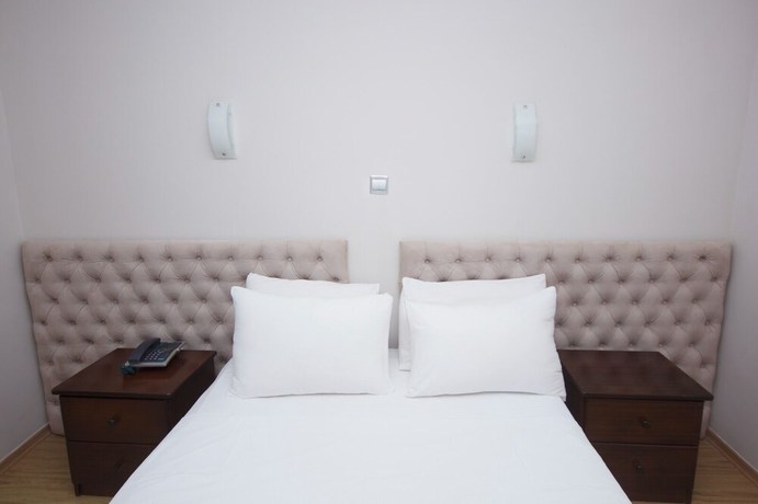 Imagen de la habitación del Hotel MV HOTEL. Foto 11