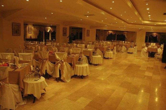 Imagen del bar/restaurante del Hotel MV HOTEL. Foto 6