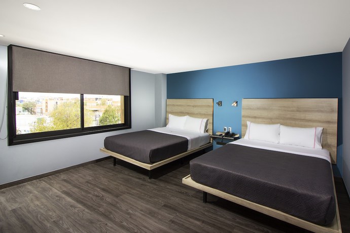 Imagen de la habitación del Hotel MX lagunilla. Foto 6