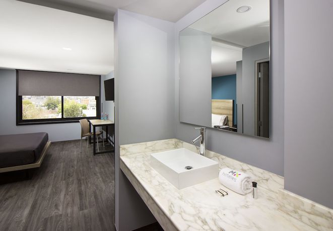 Imagen de la habitación del Hotel MX lagunilla. Foto 11