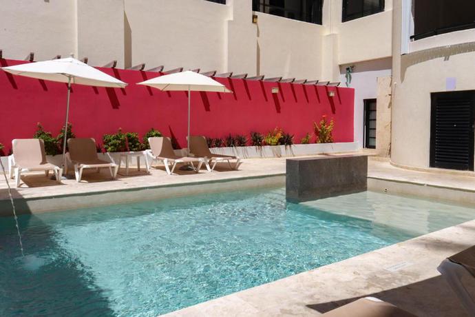 Imagen de la piscina del Hotel MX portal maya. Foto 13