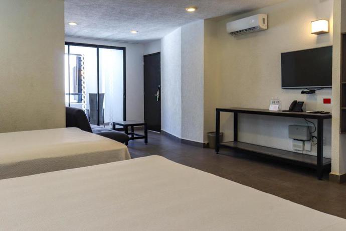 Imagen de la habitación del Hotel MX portal maya. Foto 7