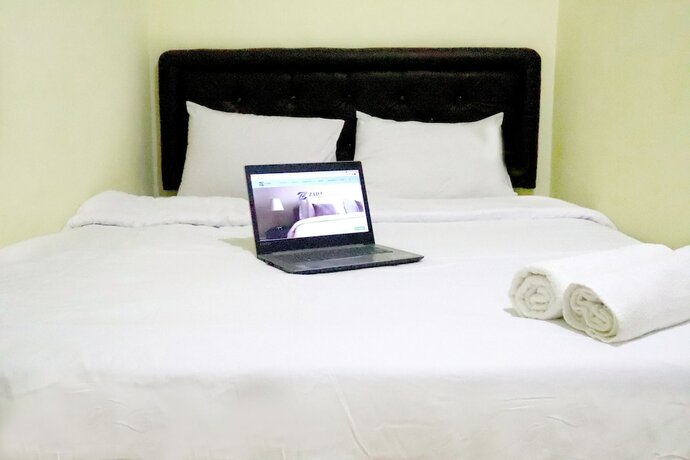 Imagen de la habitación del Hotel MY Rooms at Jombang. Foto 13