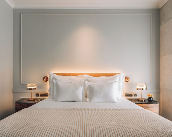 Imagen de la habitación del Hotel MYTHIC SANA Downtown Suites. Foto 5