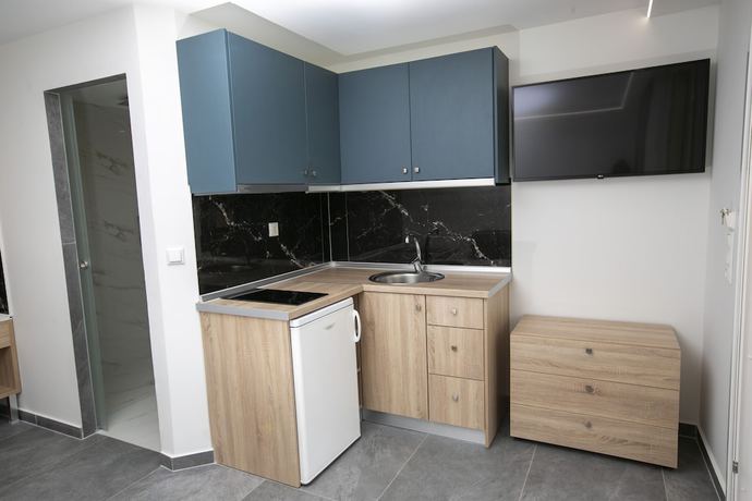 Imagen de la habitación del Hotel MYTHOS BUNGALOWS. Foto 2