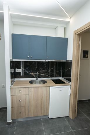Imagen de la habitación del Hotel MYTHOS BUNGALOWS. Foto 5