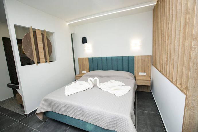 Imagen de la habitación del Hotel MYTHOS BUNGALOWS. Foto 6